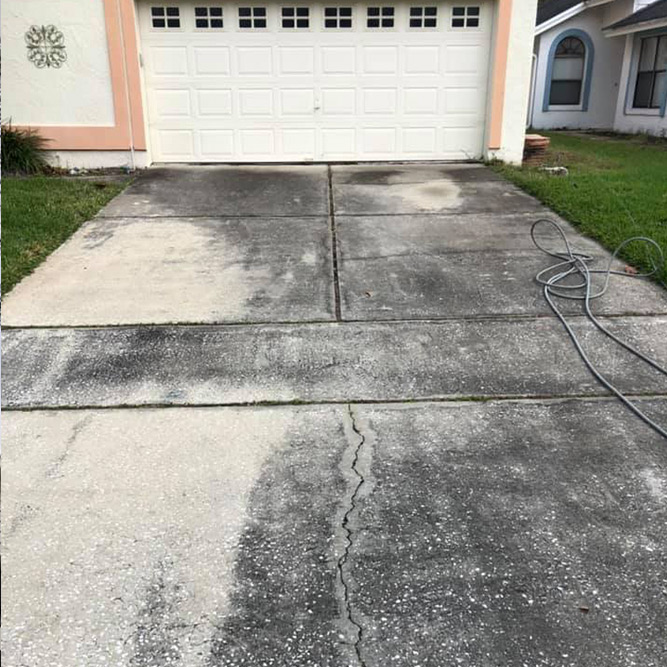 dirty private driveway before pressure washing
